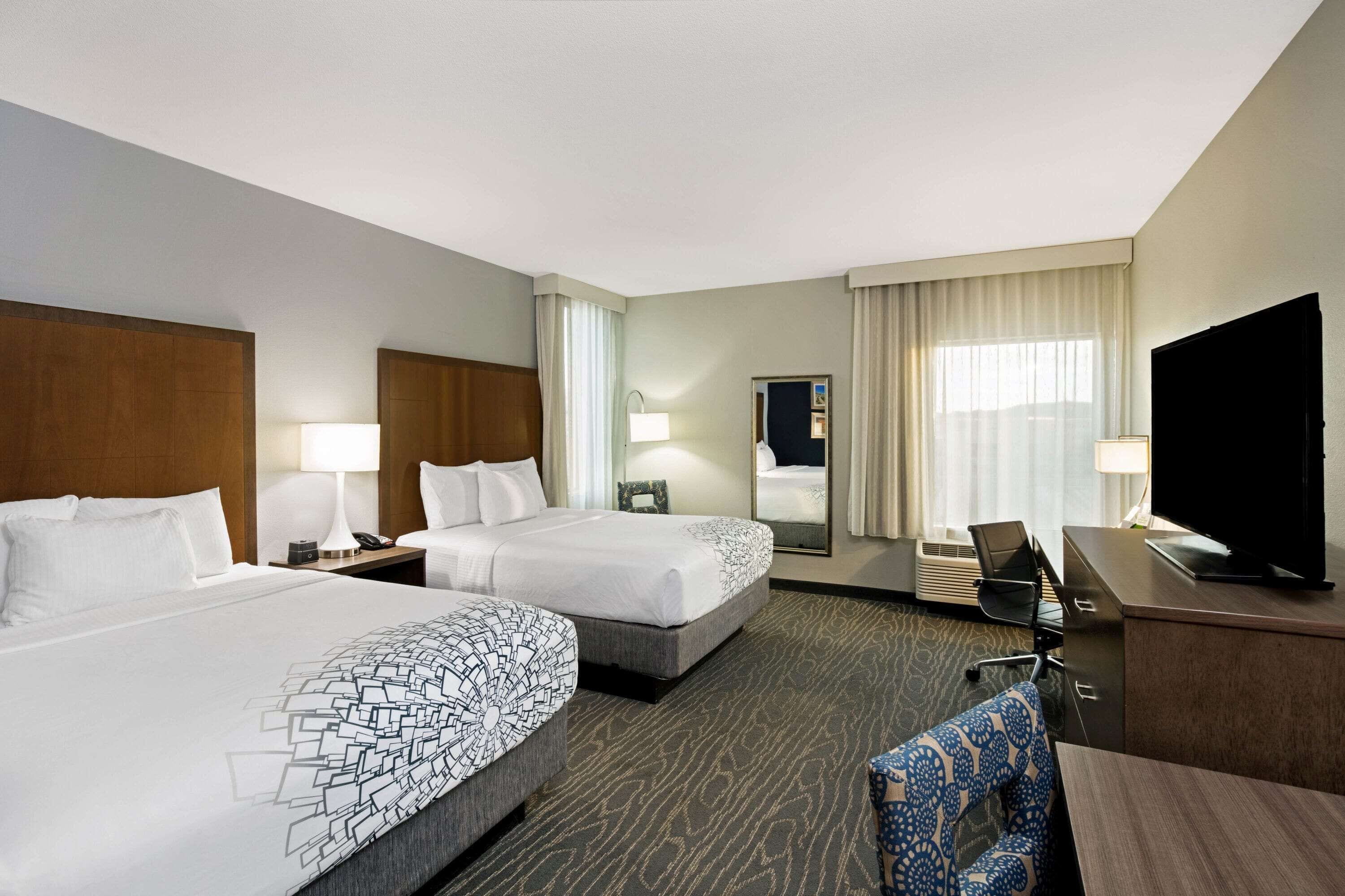 deluxe room, 2 queen beds, non smoking (family, various views) | premium bedding, desk, iron/ironing board, free cots/infant beds