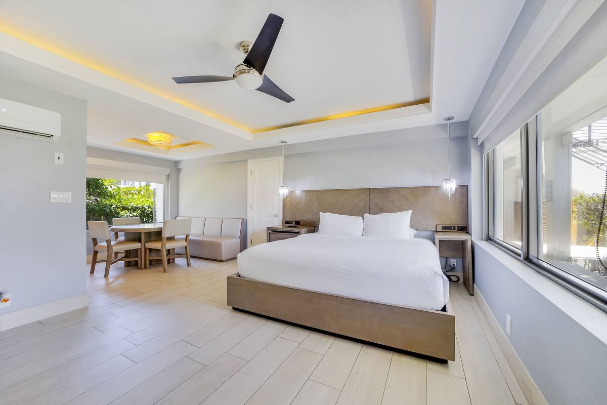 Deluxe Room, 1 King Bed, Kitchenette (Self check-in) | Premium bedding, in-room safe, blackout drapes, iron/ironing board