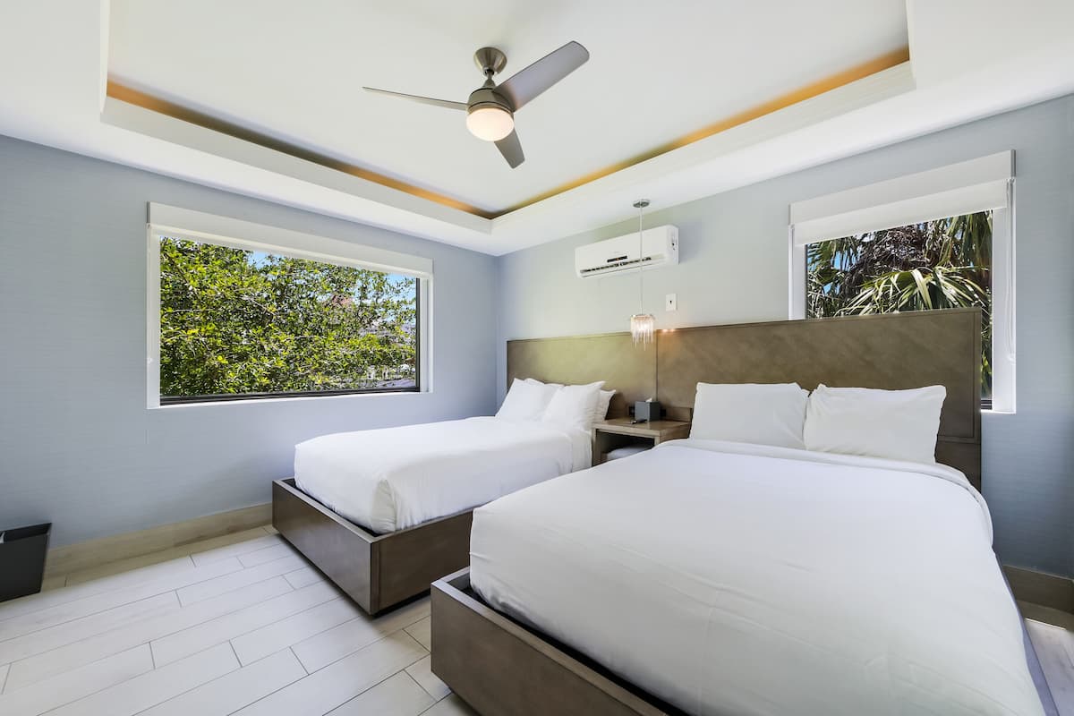 Family Suite, Multiple Beds (Self check-in) | Premium bedding, in-room safe, blackout drapes, iron/ironing board