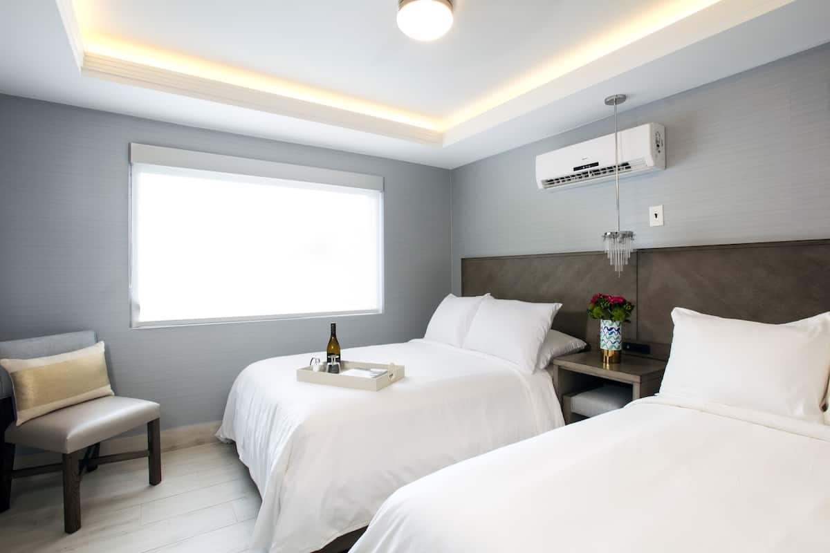 Premium bedding, in-room safe, soundproofing, iron/ironing board