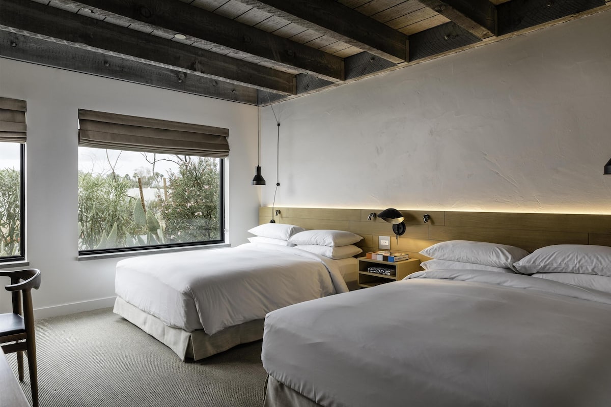 Hypo-allergenic bedding, down duvets, free minibar items, in-room safe