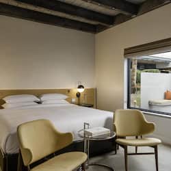 Hypo-allergenic bedding, down comforters, free minibar items