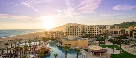 2 outdoor pools, open 8:00 AM to 8:00 PM, pool umbrellas, sun loungers