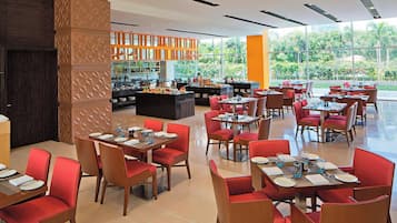 Enjoy a meal in our stylish dining area, where modern design meets comfort and functionality.