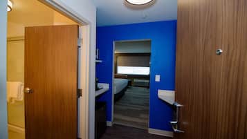 Down comforters, desk, blackout drapes, iron/ironing board