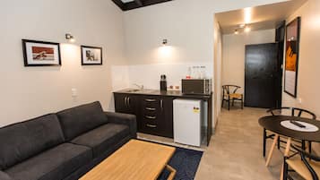 One Bedroom Studio | Living area | 32-inch flat-screen TV with digital channels, TV