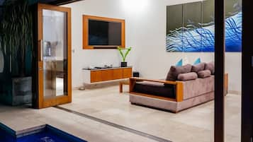 Villa, 1 Bedroom, Private Pool | Living area | 65-inch flat-screen TV with cable channels, Smart TV