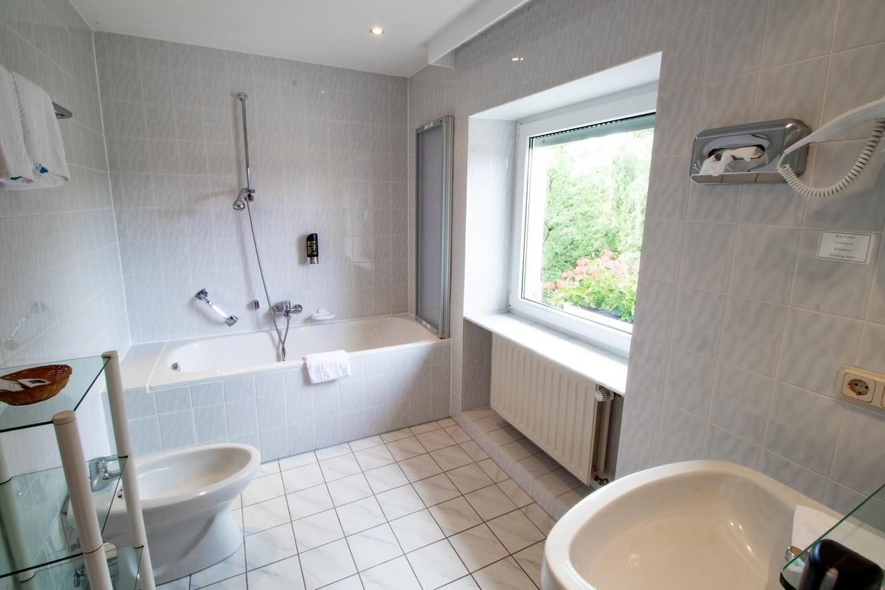 economy room | bathroom | hair dryer, bathrobes, towels