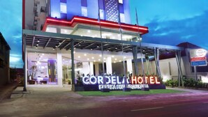 A hotel with a modern design, featuring a prominent sign for 'CORDELA HOTEL' and a visible entrance. - Cordela Kartika Dewi Jogjakarta (Yogyakarta)