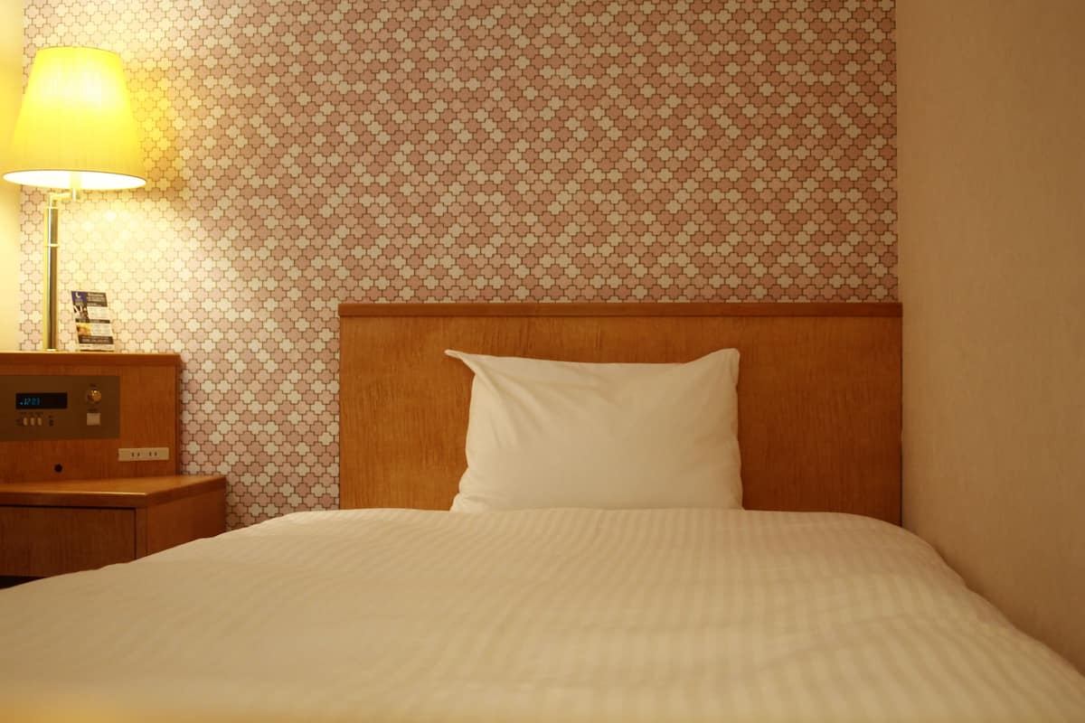 Desk, blackout curtains, free WiFi, bed sheets