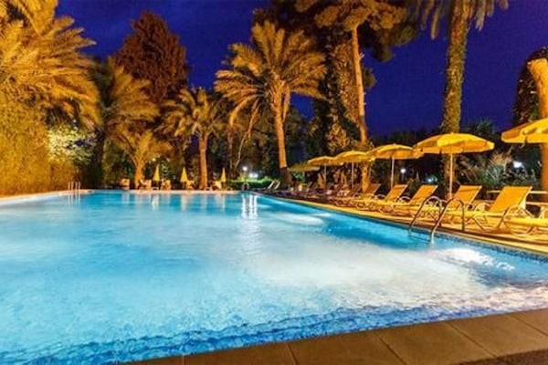 Outdoor pool, pool umbrellas, sun loungers