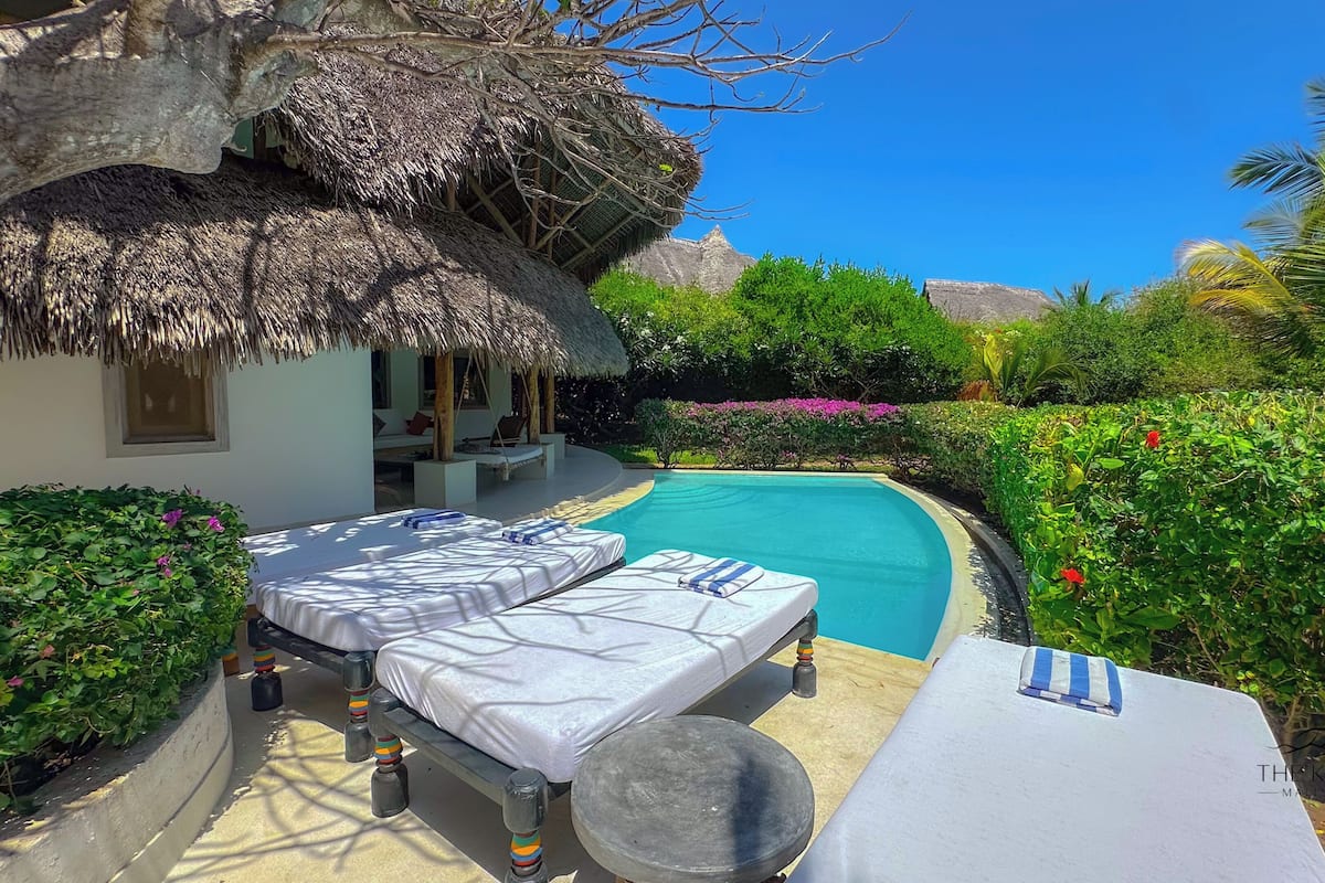 Family Villa, 4 Bedrooms | Living area | 32-inch flat-screen TV with satellite channels, TV
