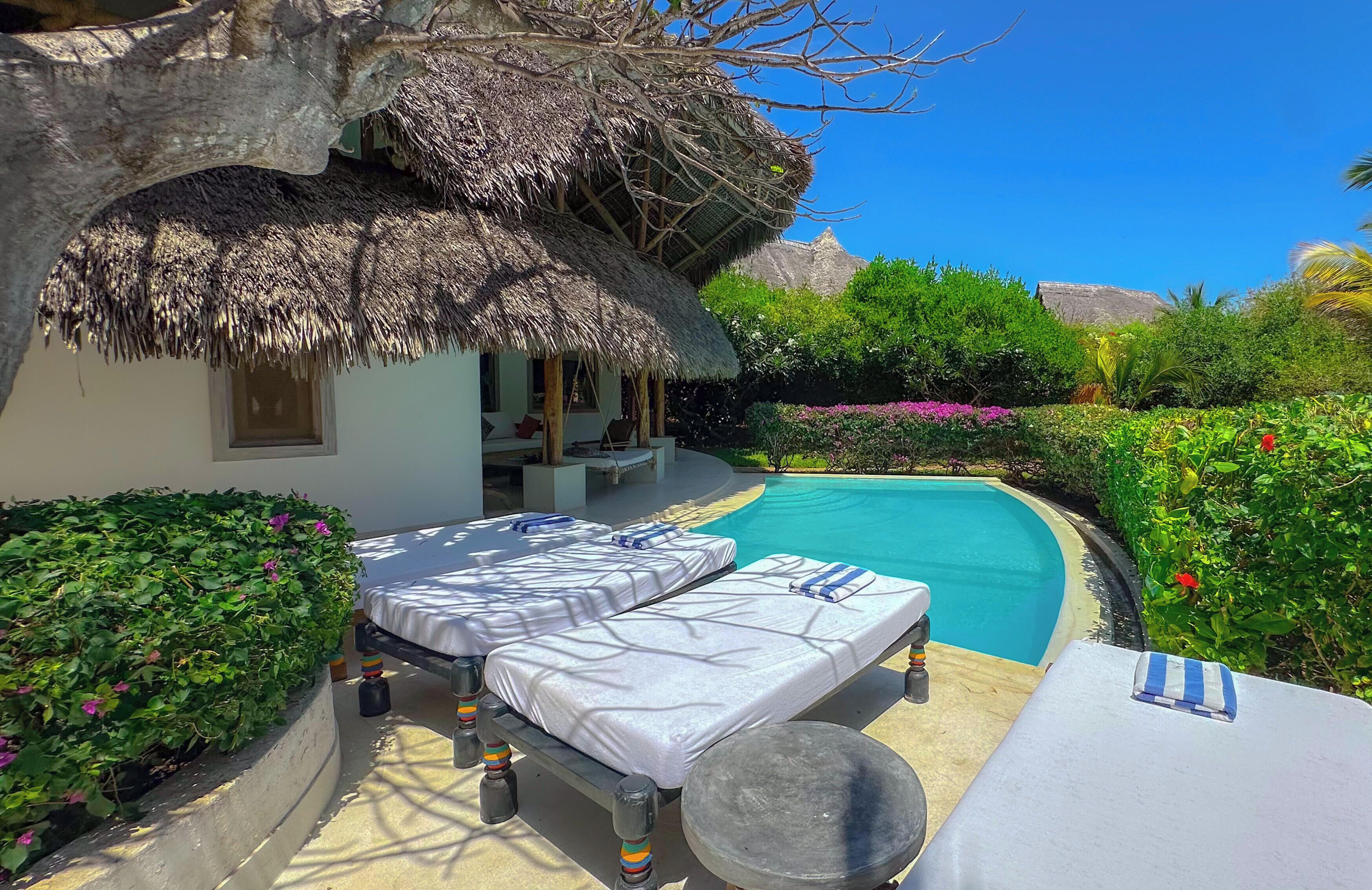 Family Villa, 4 Bedrooms | Living area | 32-inch flat-screen TV with satellite channels, TV