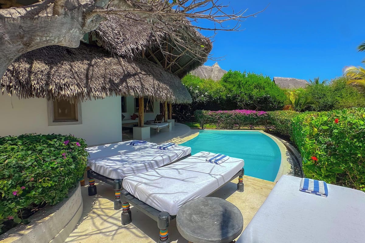 Family Villa, 4 Bedrooms | Living area | 32-inch flat-screen TV with satellite channels, TV