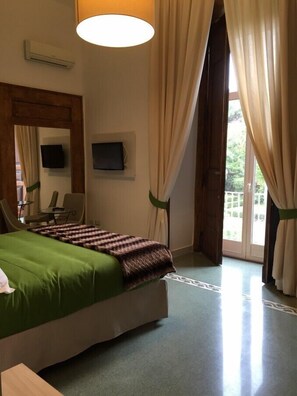 Superior Double Room, Garden View | Down comforters, minibar, in-room safe, desk