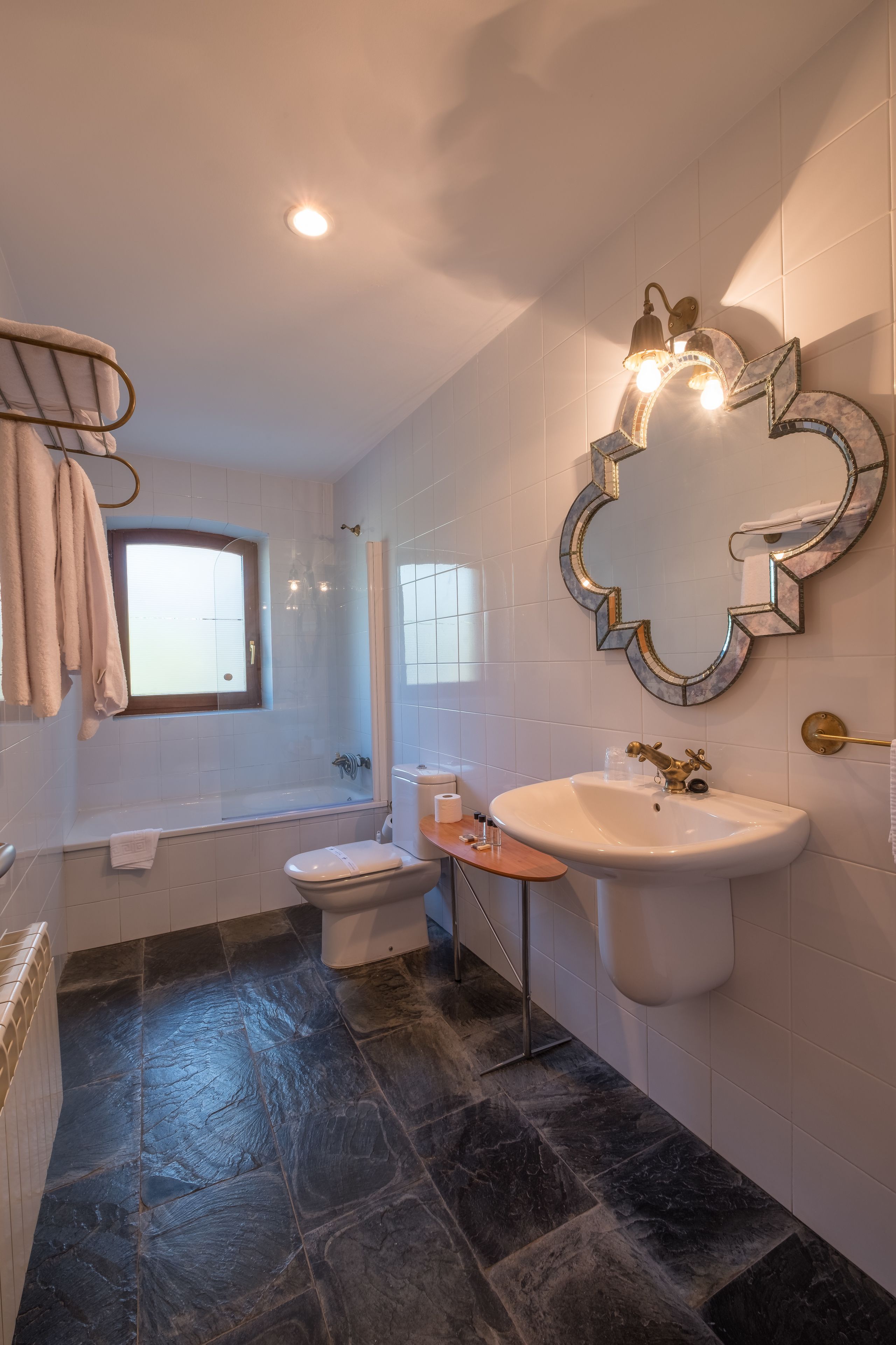 bathtub, free toiletries, hair dryer, towels