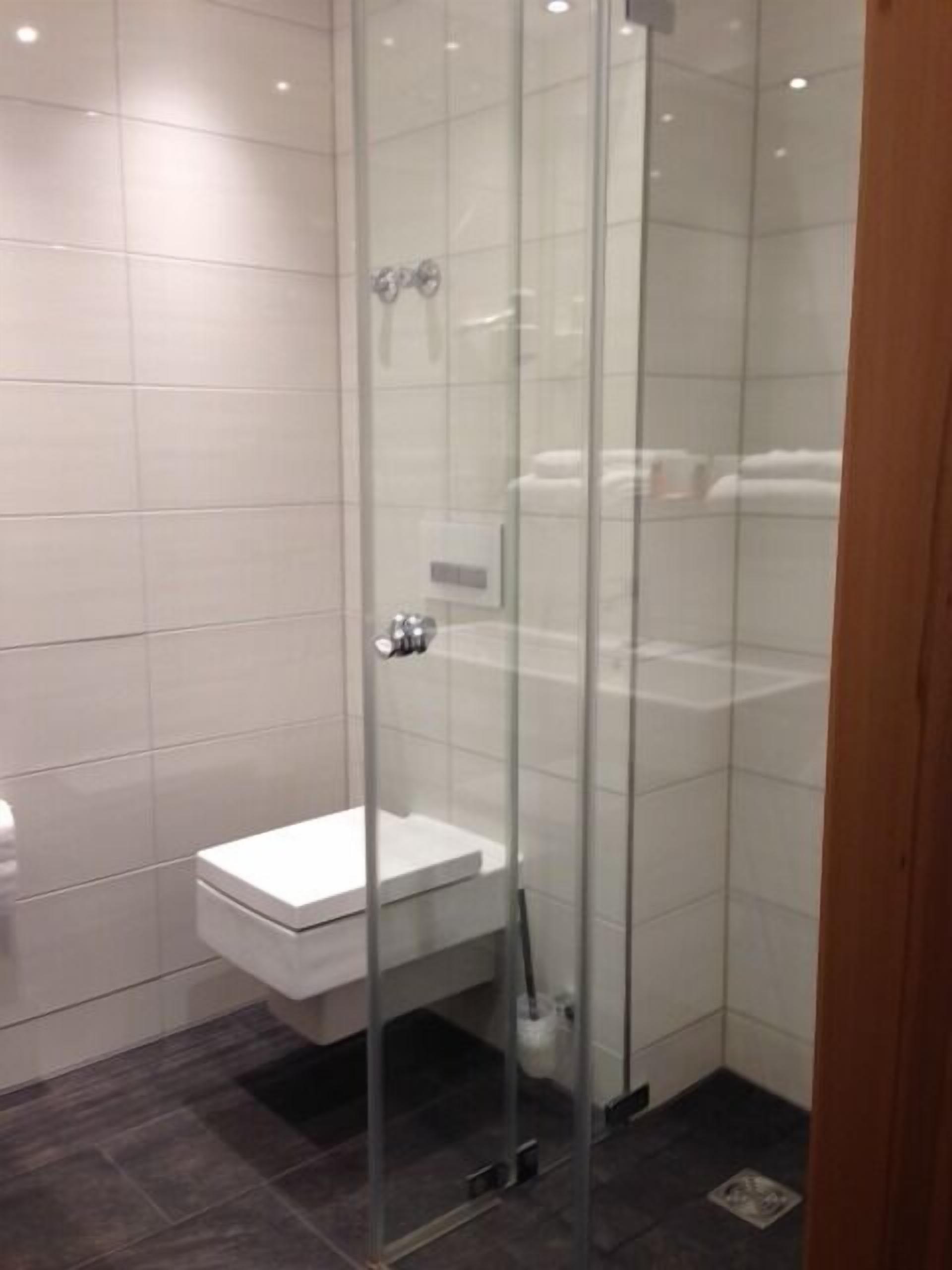 double room, lake view | bathroom | shower, free toiletries, hair dryer, towels