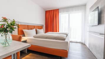 Superior Doppelzimmer mit Kingsize Bett, Seeblick | Hochwertige Bettwaren, Zimmersafe, individuell eingerichtet