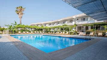 Outdoor pool, pool umbrellas, pool loungers