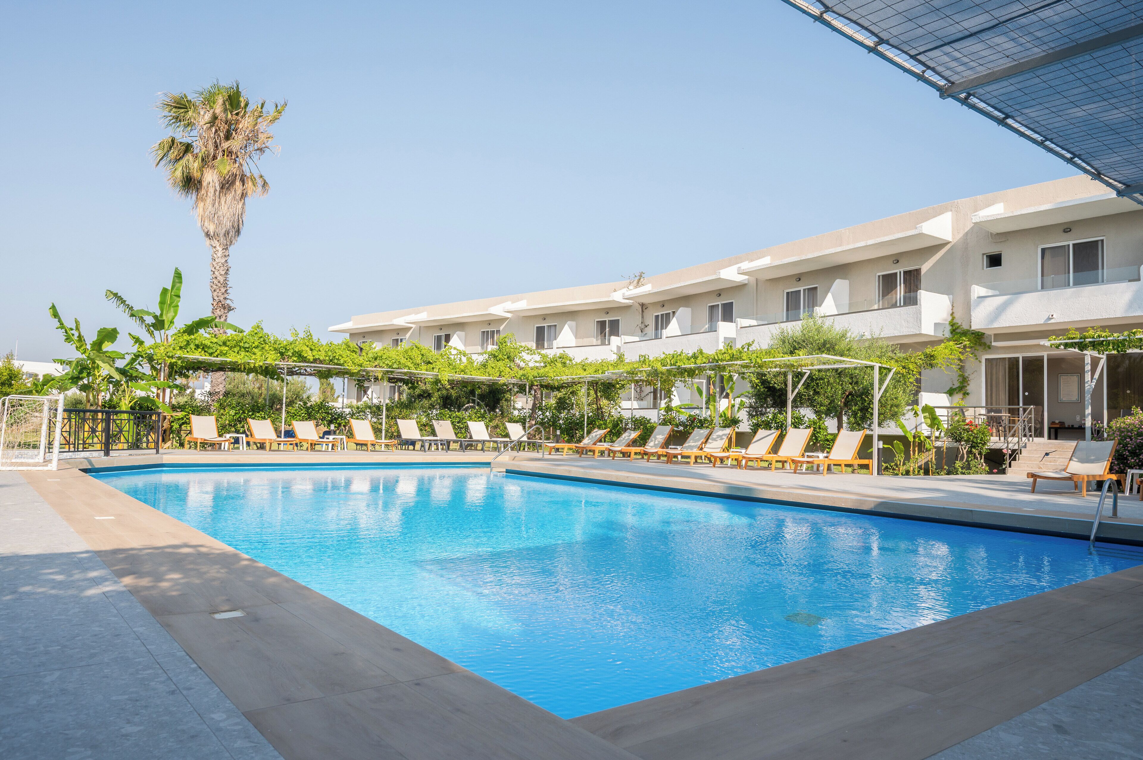 outdoor pool, pool umbrellas, pool loungers