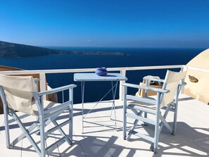 Adrales Cave House | Balcony view - OIA Unique Homes by K&K (Santorini)