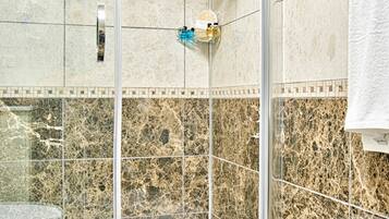 Family Apartment, 1 Bedroom, City View | Bathroom | Shower, free toiletries, hair dryer, bathrobes