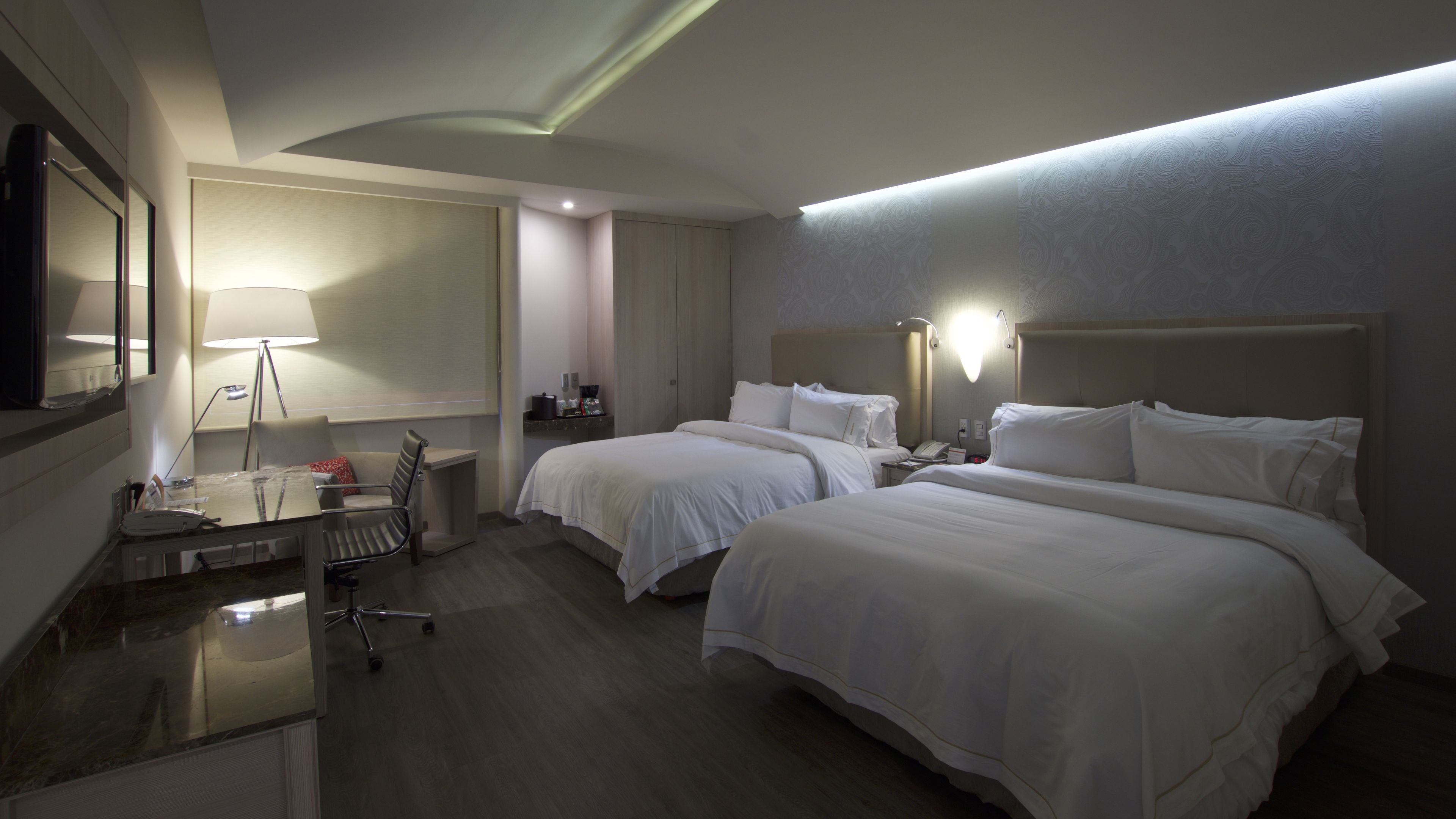 standard room, 2 queen beds | in-room safe, desk, soundproofing, iron/ironing board