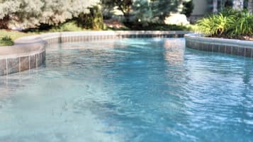 Indoor pool, seasonal outdoor pool, pool umbrellas, pool loungers