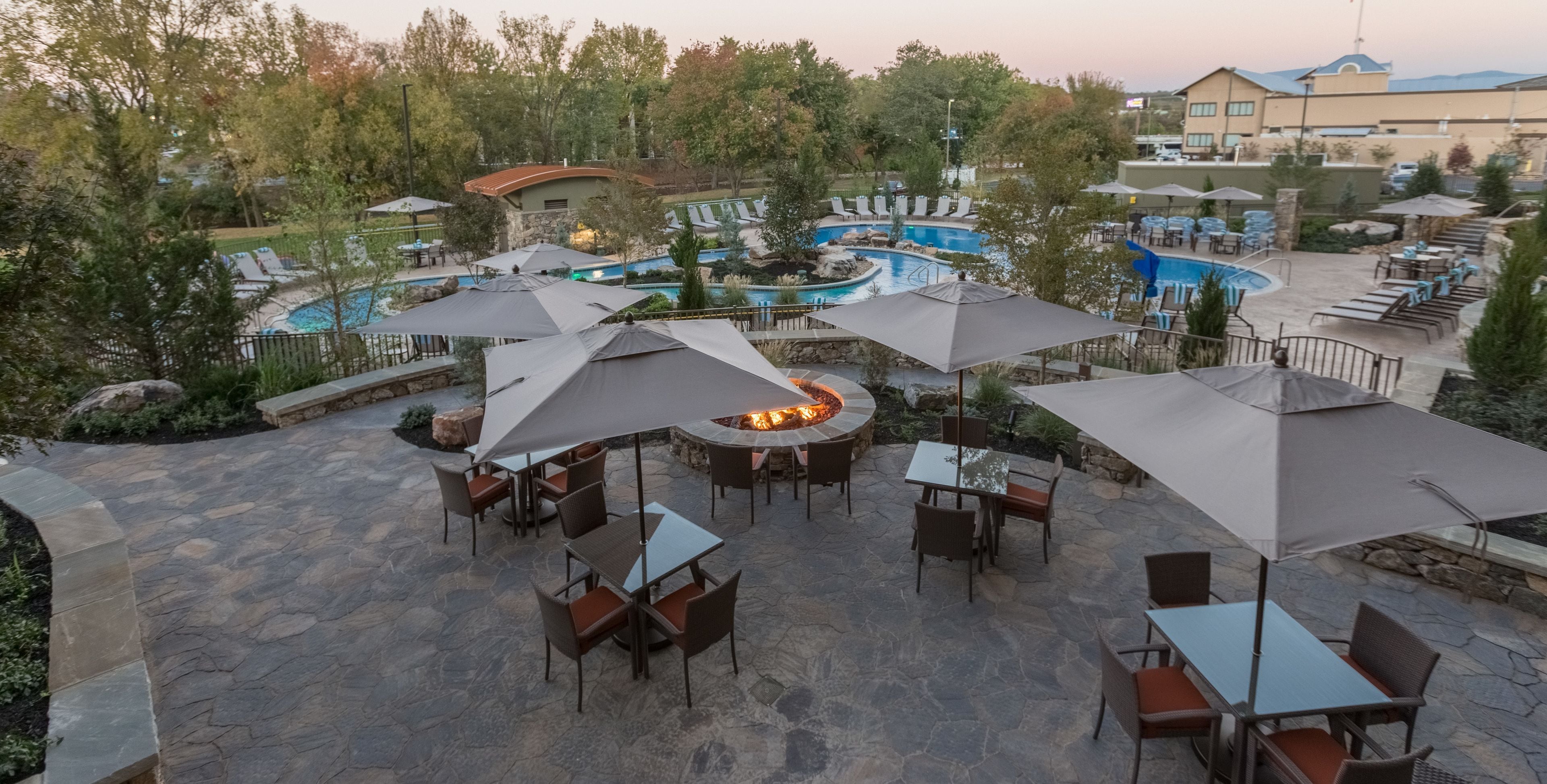 Indoor pool, seasonal outdoor pool, pool umbrellas, pool loungers