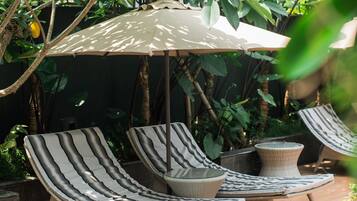 Outdoor pool, pool umbrellas, pool loungers