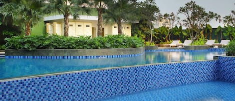 Outdoor pool, pool umbrellas, pool loungers