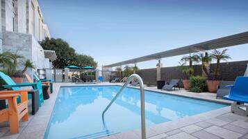 Outdoor pool, pool umbrellas, sun loungers