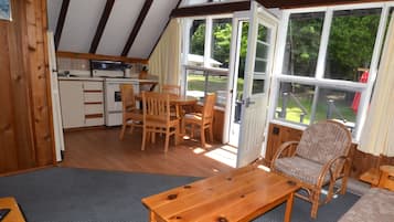 Chalet, 3 Bedrooms | Living area | 32-inch TV with satellite channels