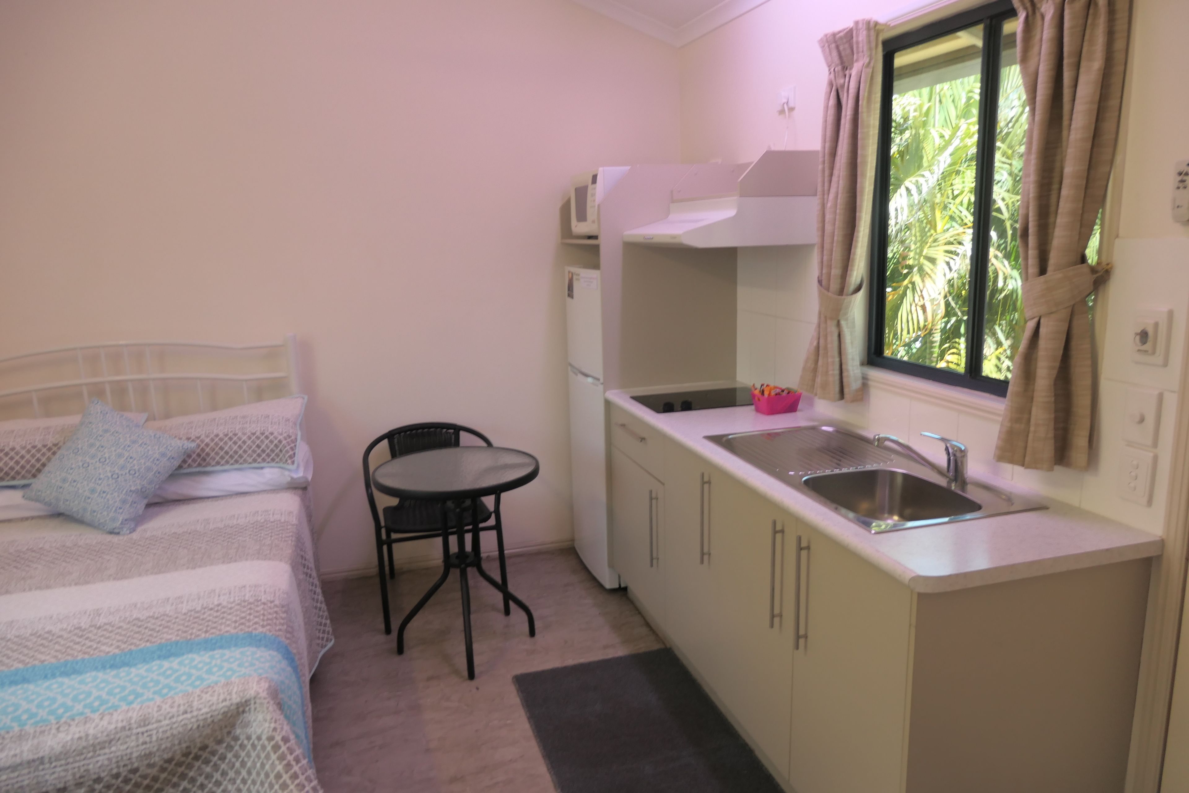 Double Room | Private kitchen | Full-sized fridge, microwave, stovetop, coffee/tea maker