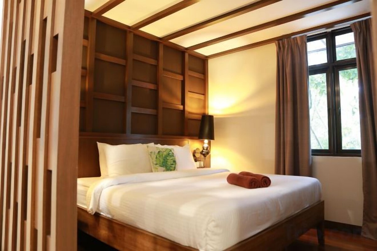 Desk, blackout curtains, iron/ironing board (on request), bed sheets
