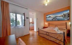 Doppelzimmer | Schreibtisch, Verdunkelungsvorhänge, schallisolierte Zimmer, Babybetten