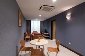 Family Apartment, 2 Bedrooms | Living room | 40-inch flat-screen TV with satellite channels, TV - One Pacific Hotel & Serviced Apartments (George Town)