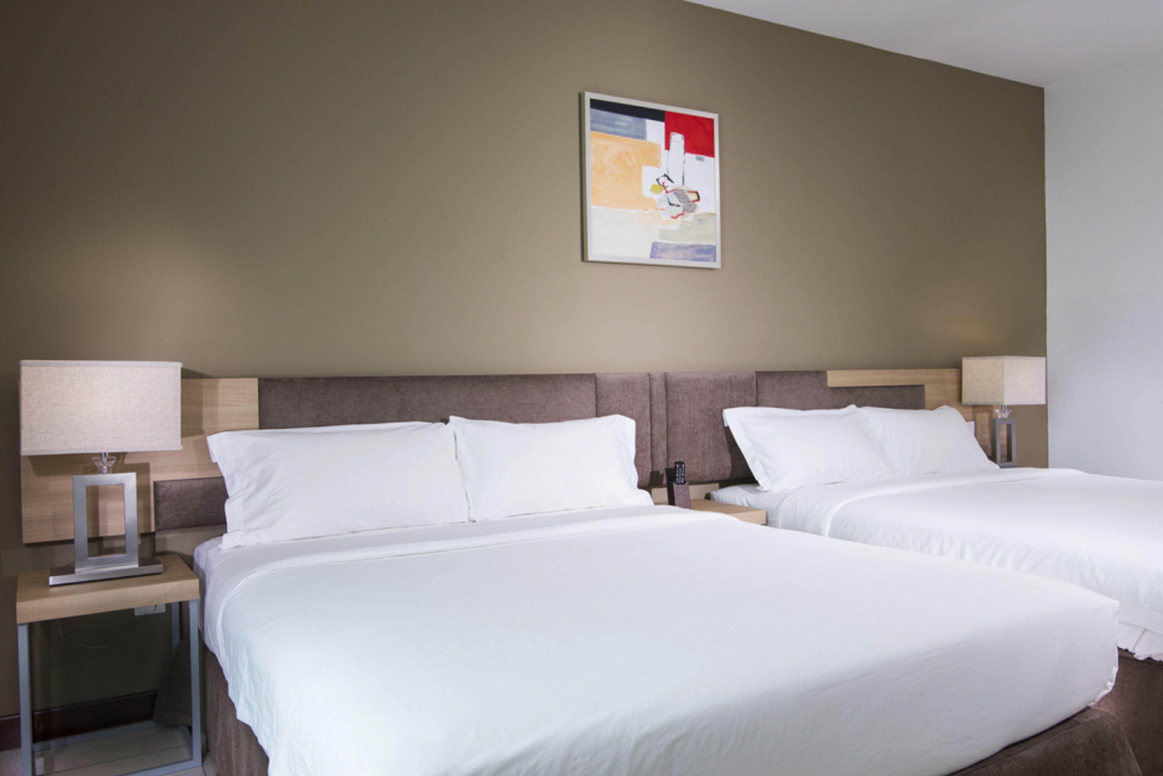 family quadruple room, 2 queen beds | in-room safe, desk, laptop workspace, blackout curtains