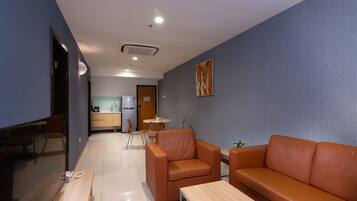 Family Apartment, 2 Bedrooms | Living area | 40-inch flat-screen TV with satellite channels, TV