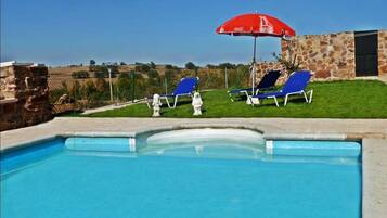 Seasonal outdoor pool, pool umbrellas, pool loungers