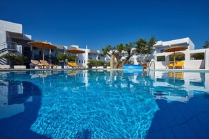 2 outdoor pools, pool umbrellas, sun loungers