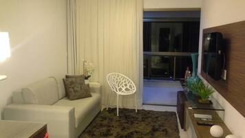 Apartment, 2 Bedrooms | Living room | Flat-screen TV
