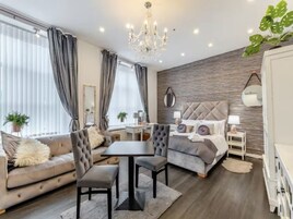 Family Room | Individually decorated, individually furnished, blackout drapes