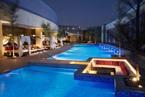 3 outdoor pools, open 7:00 AM to 7:00 PM, pool umbrellas, sun loungers - AlRayyan Hotel Doha, Curio Collection by Hilton (Al Rayyan)
