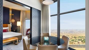 Suite Deluxe, 1 trÚs grand lit | Literie hypoallergénique, minibar, coffres-forts dans les chambres