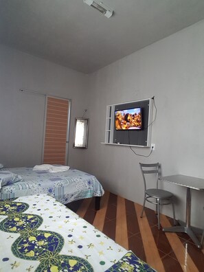 Triple Room | Individually decorated, desk, blackout drapes, iron/ironing board