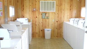 Laundry room - Happy Suites at Happy Acres (Hinesville)