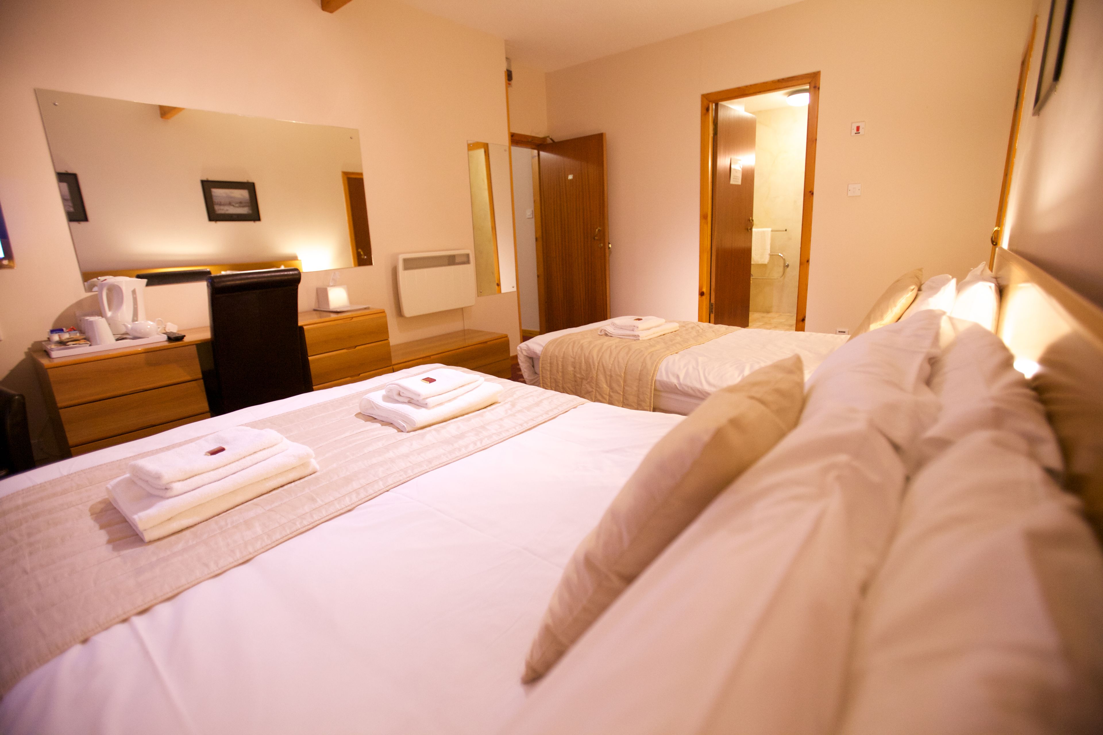 family room (harbourside house) | in-room safe, individually decorated, individually furnished, desk