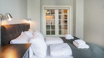 Departamento Confort, baño privado, vista al jardín (Front) | Ropa de cama de alta calidad y decoración personalizada