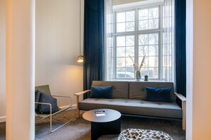 Comfort Apartment, Private Bathroom, Garden View (Front) | Living area | Flat-screen TV, pay movies - The Citadel apartments by Daniel&Jacob’s (Copenhagen)